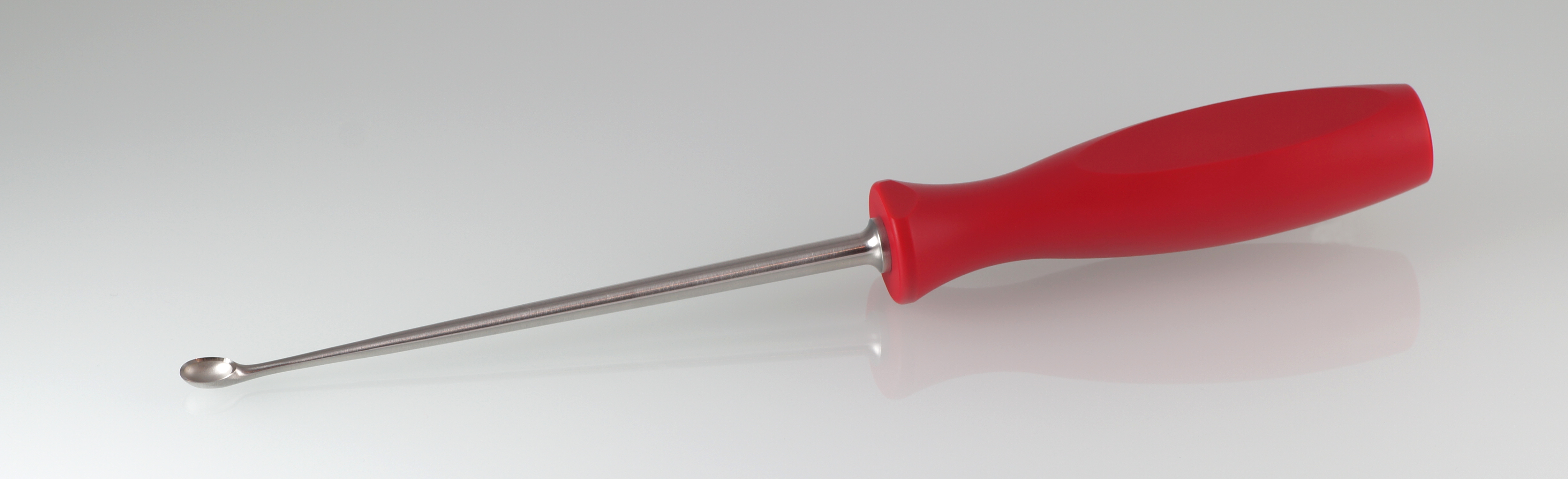BRUNS bone curette with red ergonomic handle